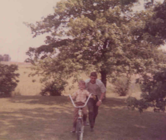 dad pushing me on bike